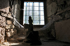 Stone Cross on Window Ledge
