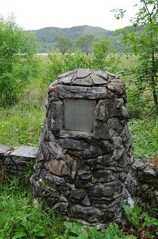 The Cairn with the Trees Beyond