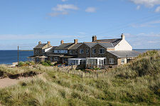 Shoreline Houses South of Amble