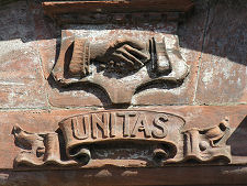 Carving Over Workspace Door