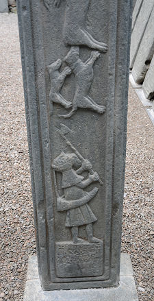 Hunting Scene on Rear of Cross