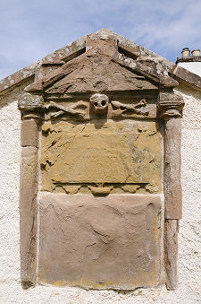 Old Graveslab Set in Churchyard Wall