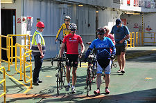 Cyclists Arriving at Cumbrae Slip