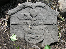 Stone Almost Buried Inside Church