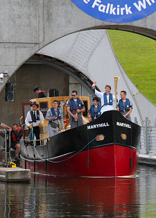The Olymic Torch Rides the Wheel