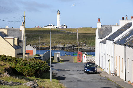 Port Wemyss with Orosay and the Rhinns of Islay Lighthouse Beyond