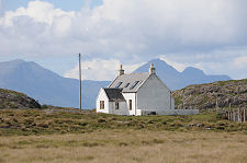 Cottage, With Rum in Background