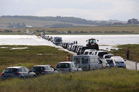 Queueing to Leave, Some Time Before the Published Opening Time