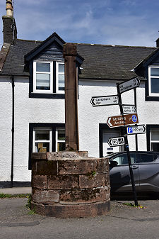 Mercat Cross and Bent Roadsign