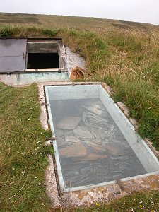 Cairn Entrance & View of External Wall