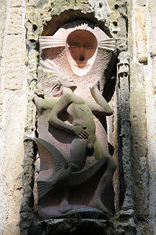 Holy Trinity Sculpture Above Porch