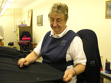 Checking the Woven Cloth by Hand