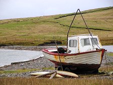 Fishing Boat and Canoes