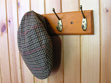 Hat Hanging at Rear of Church