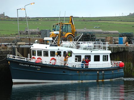The MV Golden Mariana at Gill Pier, Pierowall